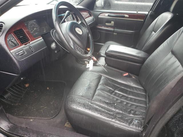 Photo 7 from auction – 2004 LINCOLN TOWN CAR E with VIN 1L1FM81W14Y667731