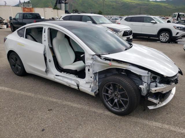 Photo 4 from auction – 2021 TESLA MODEL 3 with VIN 5YJ3E1EBXMF999409