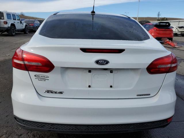 Photo 6 from auction – 2015 FORD FOCUS S with VIN 1FADP3E21FL380410