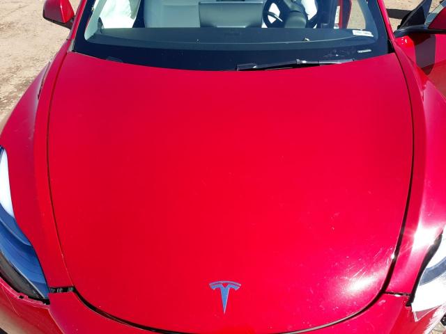Photo 11 from auction – 2022 TESLA MODEL 3 with VIN 5YJ3E1EB0NF128777