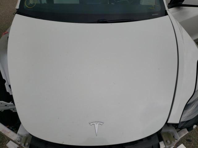 Photo 11 from auction – 2021 TESLA MODEL 3 with VIN 5YJ3E1EBXMF999409