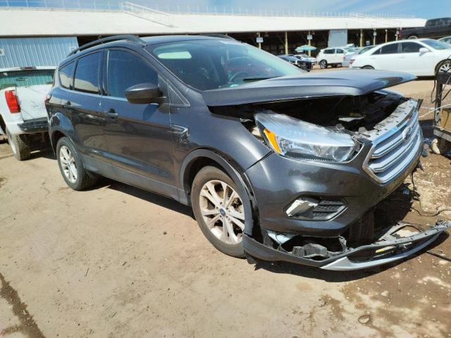 Photo 4 from auction – 2018 FORD ESCAPE SE with VIN 1FMCU9GD5JUC09397