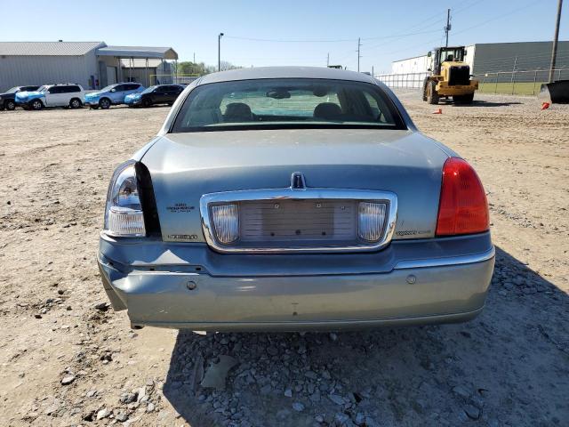 Photo 6 from auction – 2004 LINCOLN TOWN CAR E with VIN 1LNHM81W74Y645966