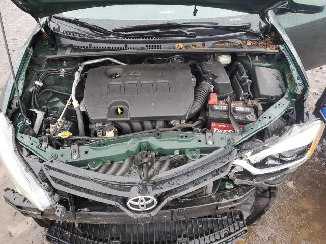 Photo 11 from auction – 2014 TOYOTA COROLLA EC with VIN 2T1BPRHE2EC000667