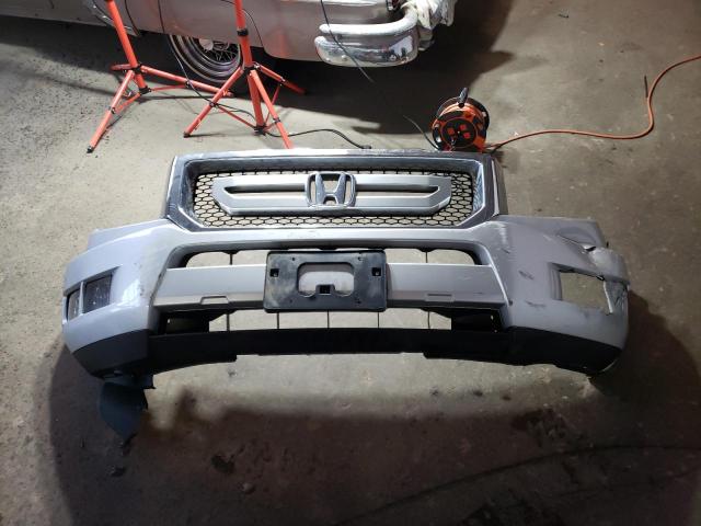 Photo 12 from auction – 2010 HONDA RIDGELINE with VIN 5FPYK1F52AB005894
