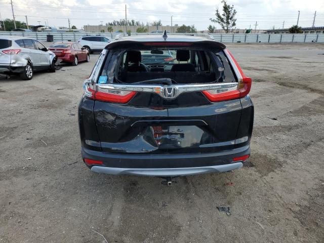 Photo 6 from auction – 2017 HONDA CR-V EX with VIN 7FARW1H53HE000913