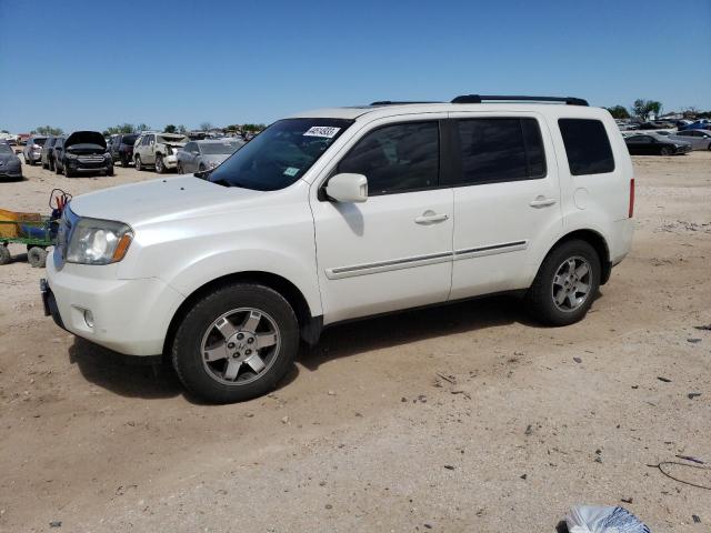 HONDA PILOT TOUR 2011 with VIN 5FNYF3H91BB057124 - Photo from auction
