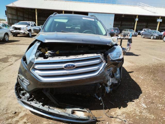 Photo 5 from auction – 2018 FORD ESCAPE SE with VIN 1FMCU9GD5JUC09397