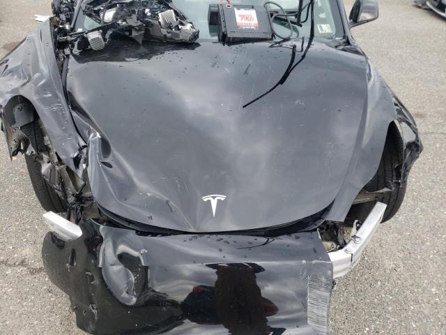 Photo 11 from auction – 2023 TESLA MODEL 3 with VIN 5YJ3E1EA6PF450690