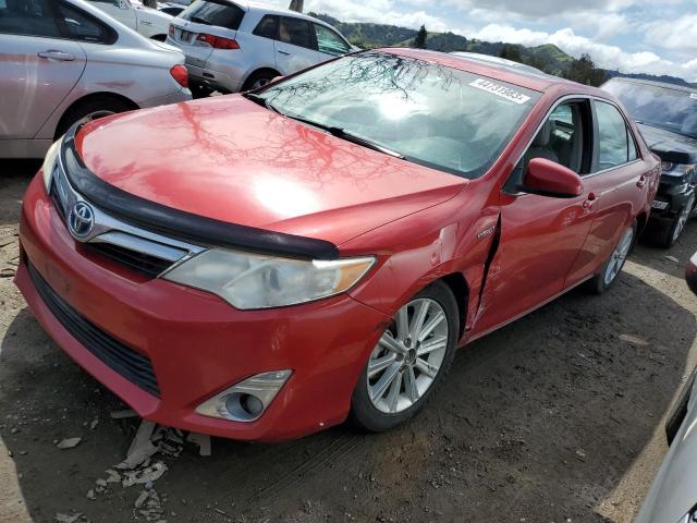 Photo 1 from auction – 2014 TOYOTA CAMRY HYBR with VIN 4T1BD1FK3EU110581