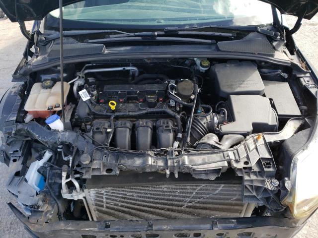 Photo 11 from auction – 2014 FORD FOCUS SE with VIN 1FADP3F2XEL323149