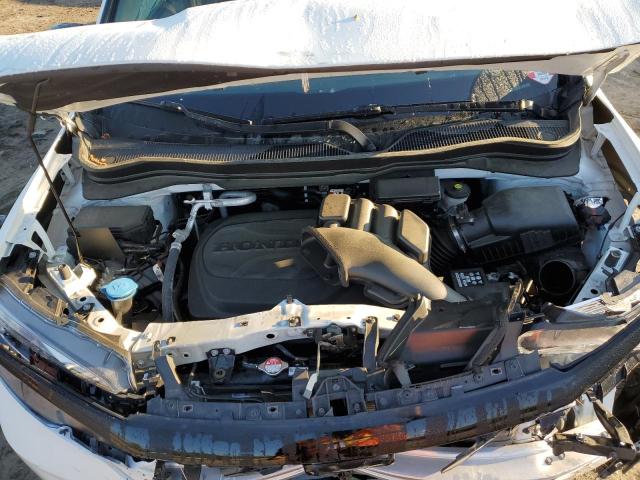 Photo 12 from auction – 2021 HONDA PASSPORT E with VIN 5FNYF7H55MB010945