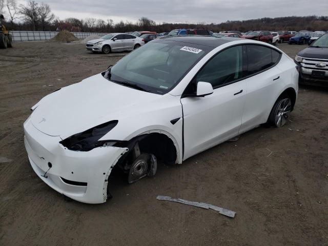 TESLA MODEL Y 2022 con VIN 7SAYGAEE6NF329225 - Foto de la subasta