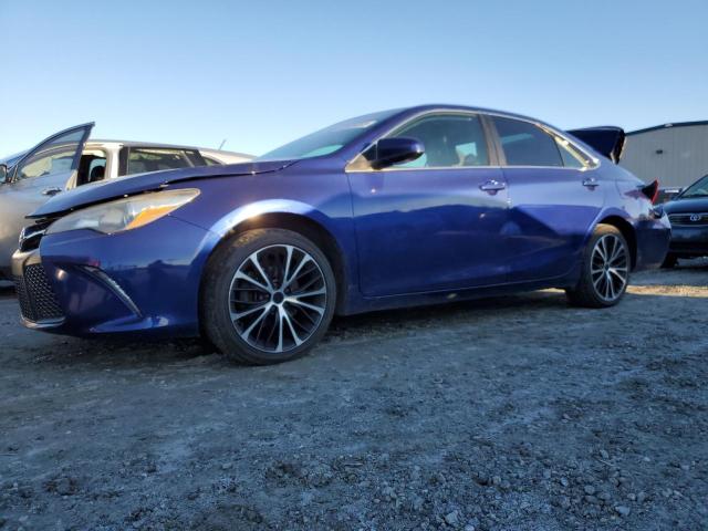 TOYOTA CAMRY LE 2016 with VIN 4T1BF1FKXGU586016 - Photo from auction