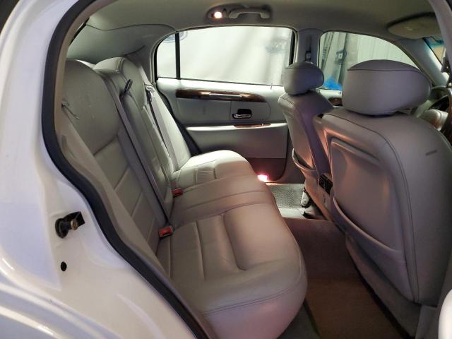 Photo 10 from auction – 2002 LINCOLN TOWN CAR E with VIN 1LNHM81W02Y611199