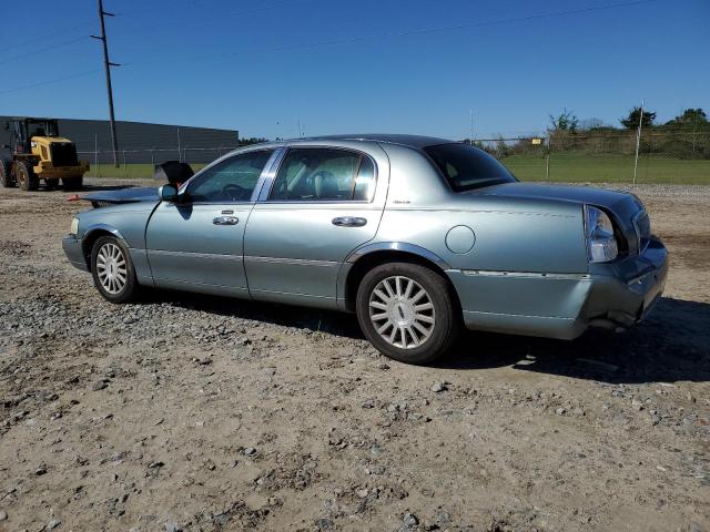Photo 2 from auction – 2004 LINCOLN TOWN CAR E with VIN 1LNHM81W74Y645966