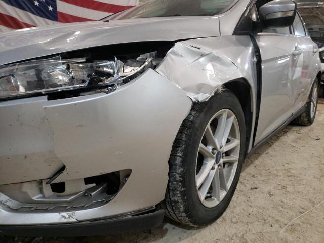 Photo 12 from auction – 2015 FORD FOCUS SE with VIN 1FADP3K20FL250526
