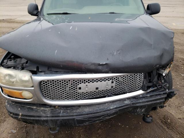 Photo 12 from auction – 2004 GMC YUKON DENA with VIN 1GKFK66U74J209404