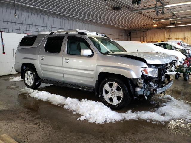 Photo 4 from auction – 2010 HONDA RIDGELINE with VIN 5FPYK1F52AB005894