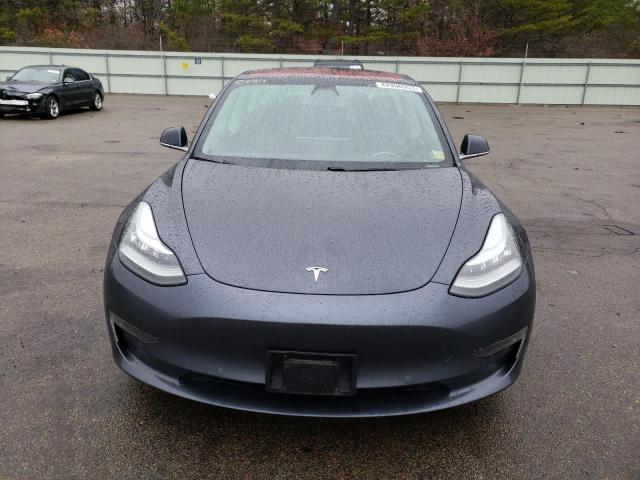 Photo 5 from auction – 2018 TESLA MODEL 3 with VIN 5YJ3E1EB5JF068859
