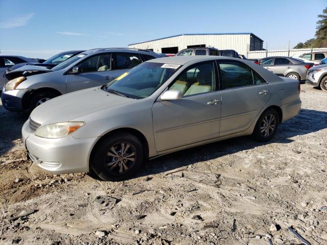 TOYOTA CAMRY LE 2004 with VIN 4T1BF32K44U076242 - Photo from auction