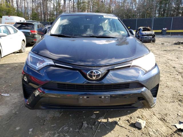 Photo 5 from auction – 2018 TOYOTA RAV4 LE with VIN 2T3ZFREV8JW445937