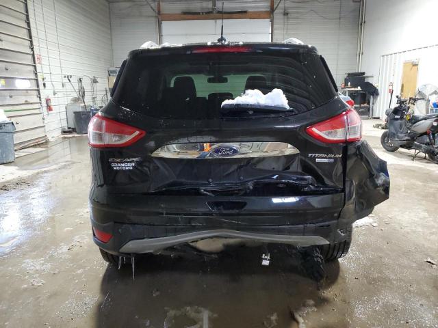 Photo 6 from auction – 2014 FORD ESCAPE TIT with VIN 1FMCU9JX9EUA20227