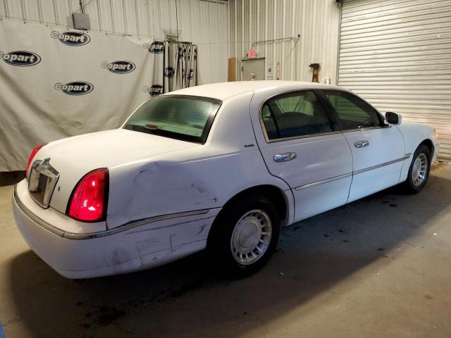 Photo 3 from auction – 2002 LINCOLN TOWN CAR E with VIN 1LNHM81W02Y611199