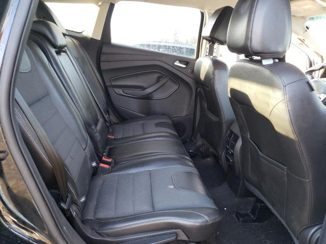 Photo 11 from auction – 2016 FORD ESCAPE SE with VIN 1FMCU9GXXGUA08839