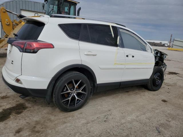 Photo 3 from auction – 2016 TOYOTA RAV4 SE with VIN JTMJFREV8GJ058390