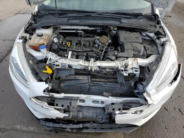 Photo 11 from auction – 2015 FORD FOCUS S with VIN 1FADP3E21FL380410