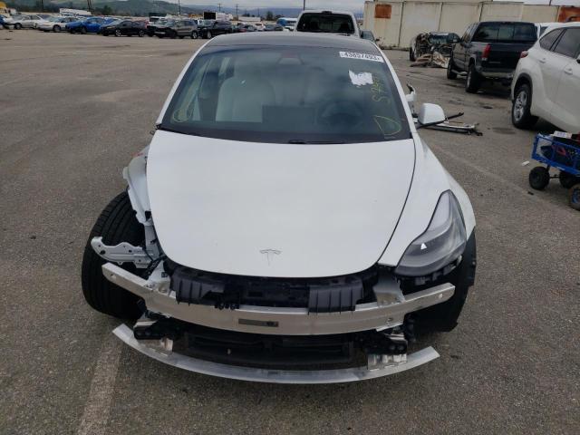 Photo 5 from auction – 2021 TESLA MODEL 3 with VIN 5YJ3E1EBXMF999409