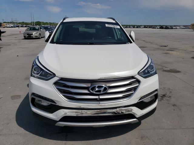 Photo 5 from auction – 2017 HYUNDAI SANTA FE S with VIN 5NMZU3LB7HH028657