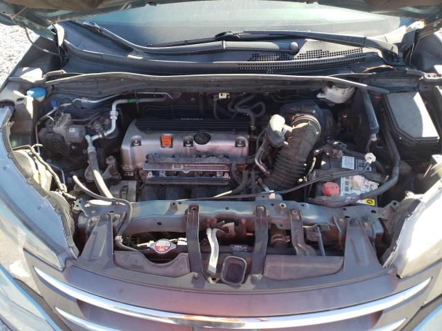 Photo 11 from auction – 2014 HONDA CR-V LX with VIN 2HKRM3H31EH560874