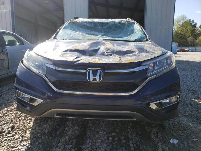 Photo 5 from auction – 2015 HONDA CR-V EXL with VIN 2HKRM4H77FH627889