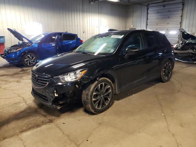 MAZDA CX-5 GT 2016 with VIN JM3KE4DY3G0848585 - Photo from auction