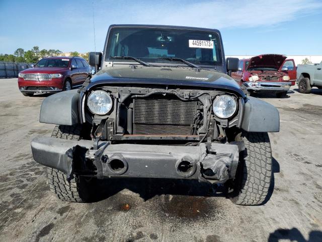 Photo 5 from auction – 2016 JEEP WRANGLER U with VIN 1C4BJWDG0GL308729