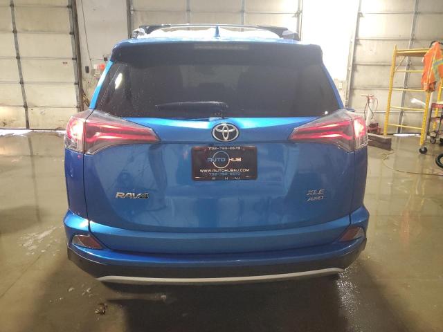Photo 6 from auction – 2017 TOYOTA RAV4 XLE with VIN JTMRFREV0HD200315