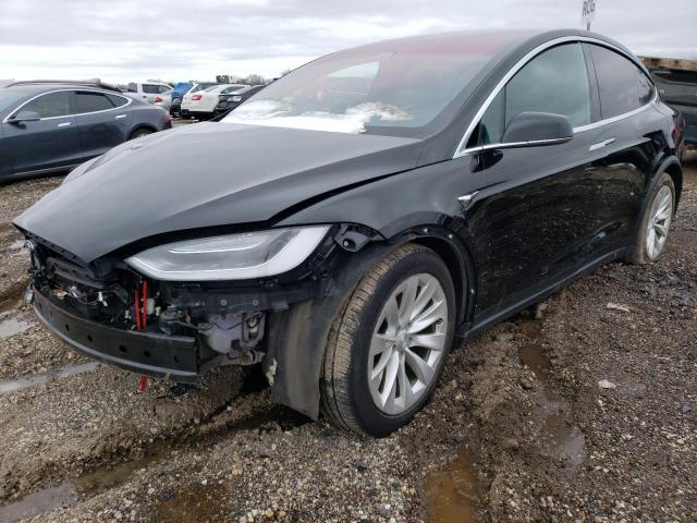 TESLA MODEL X 2017 with VIN 5YJXCBE29HF053871 - Photo from auction