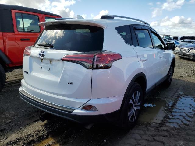 Photo 3 from auction – 2018 TOYOTA RAV4 LE with VIN 2T3ZFREV4JW458121