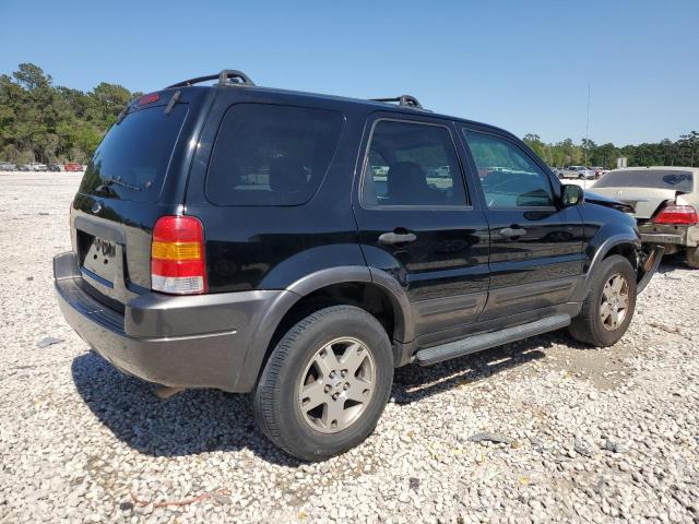Photo 3 from auction – 2003 FORD ESCAPE XLT with VIN 1FMYU93183KE20867