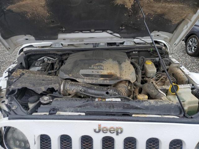 Photo 12 from auction – 2014 JEEP WRANGLER U with VIN 1C4BJWEG1EL309464