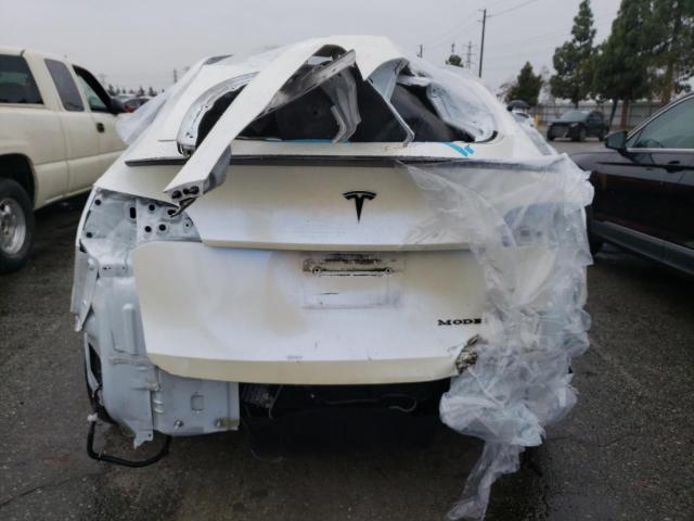 Photo 6 from auction – 2021 TESLA MODEL Y with VIN 5YJYGDEE0MF080403