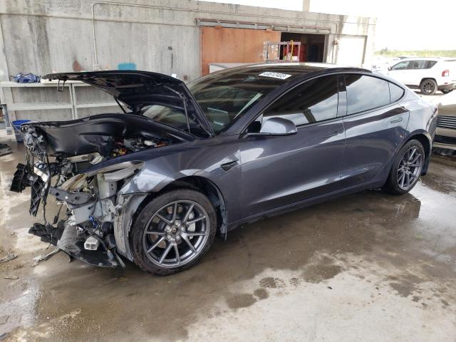 TESLA MODEL 3 2022 with VIN 5YJ3E1EB7NF249130 - Photo from auction