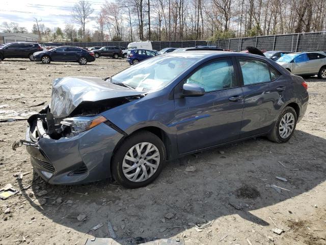 TOYOTA COROLLA L 2018 with VIN 5YFBURHE7JP801968 - Photo from auction