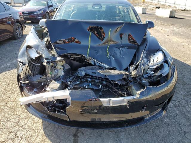 Photo 11 from auction – 2022 TESLA MODEL 3 with VIN 5YJ3E1EA5NF303855