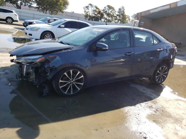 TOYOTA COROLLA L 2017 with VIN 5YFBURHE0HP680923 - Photo from auction
