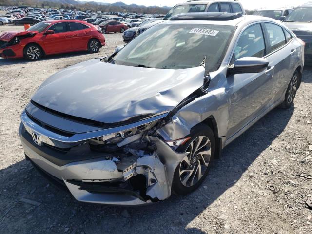 Photo 9 from auction – 2018 HONDA CIVIC EX with VIN 19XFC2F73JE027395