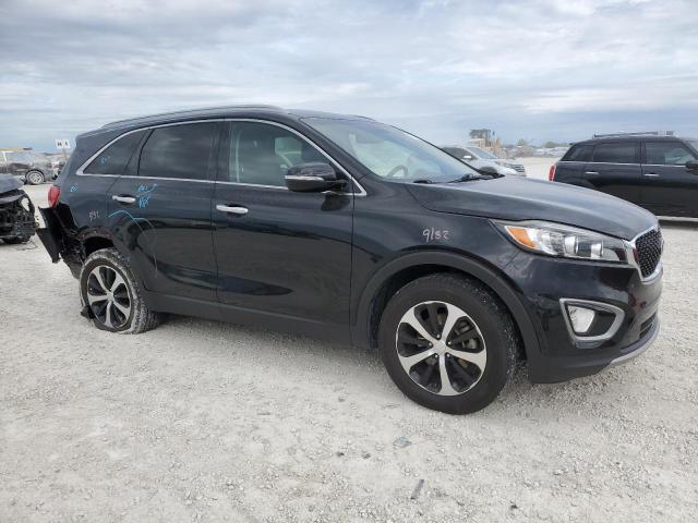 Photo 4 from auction – 2016 KIA SORENTO EX with VIN 5XYPH4A12GG010927