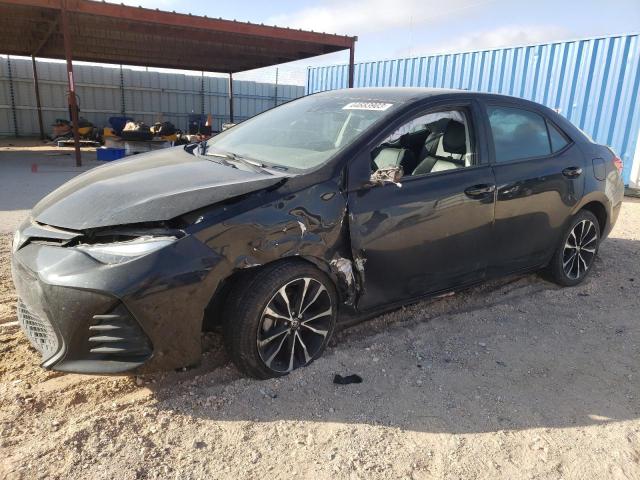 TOYOTA COROLLA L 2018 with VIN 5YFBURHE5JP855317 - Photo from auction